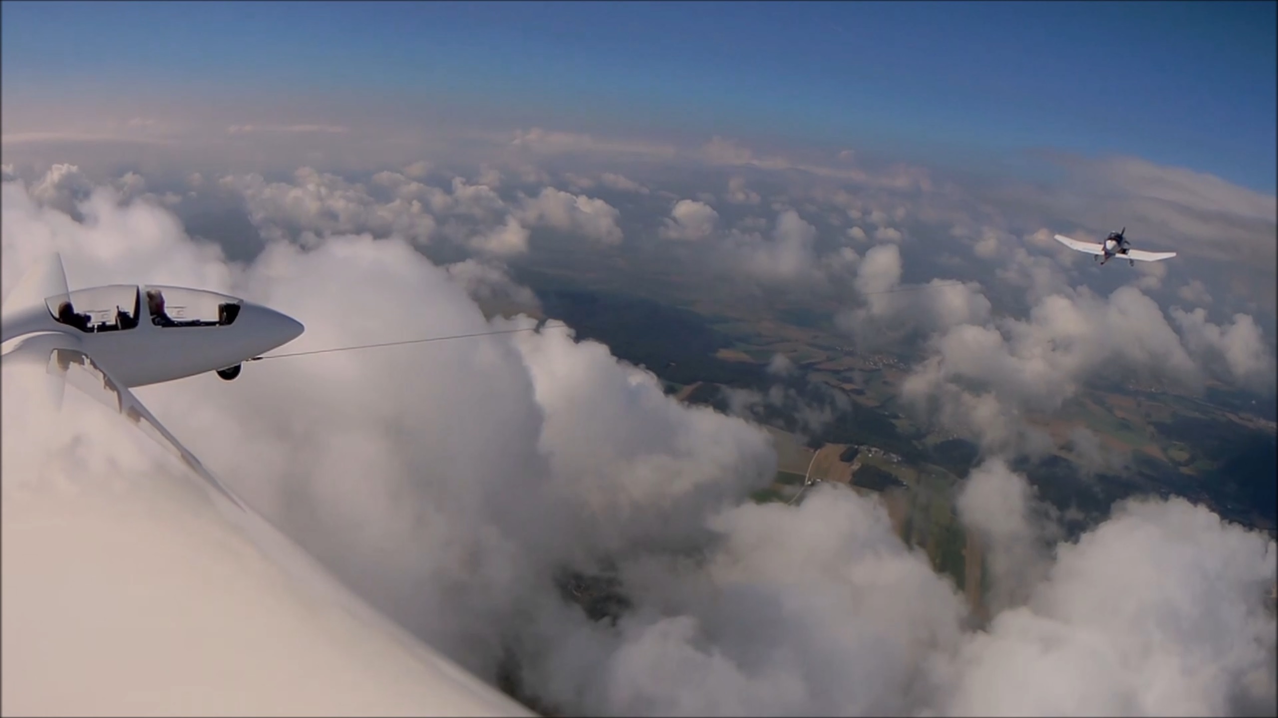 Segelkunstflug ber den Wolken Schlepp Bild 1